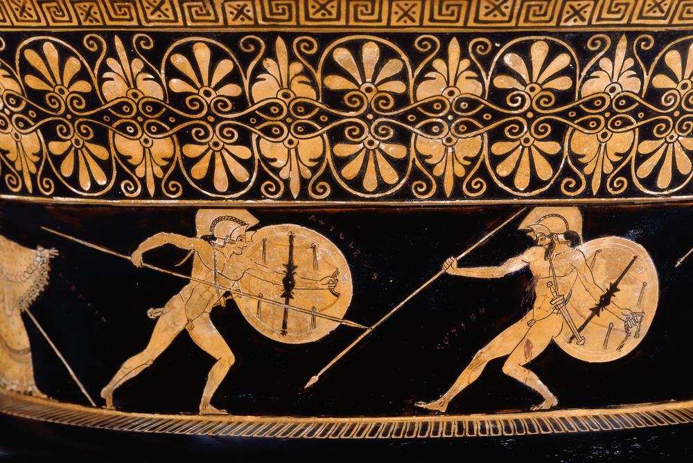 Pottery: red-figured volute-krater (bowl for mixing wine and water) with figure scenes on confined to a narrow, frieze-like band that encircles the lower element of the neck. (a) Combat of Achilles and Hector in the presence of Athena and Apollo. On the left, Achilles (youthful) presses forward with shield advanced and spear shortened to deal a finishing stroke to Hector (bearded), who, bleeding from wounds in the chest and left thigh, sinks helplessly backwards, with shield extended to right and point of spear dropped; each has a helmet with raised cheek-pieces, and a sword at side attached to his cross-belt. 
